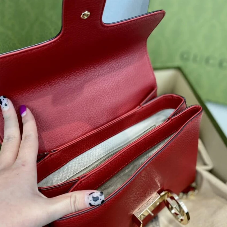 Louis vuitton locations 6.25cm (a Gucci Red Leather Interlocking GG Clasp Convertible Bag