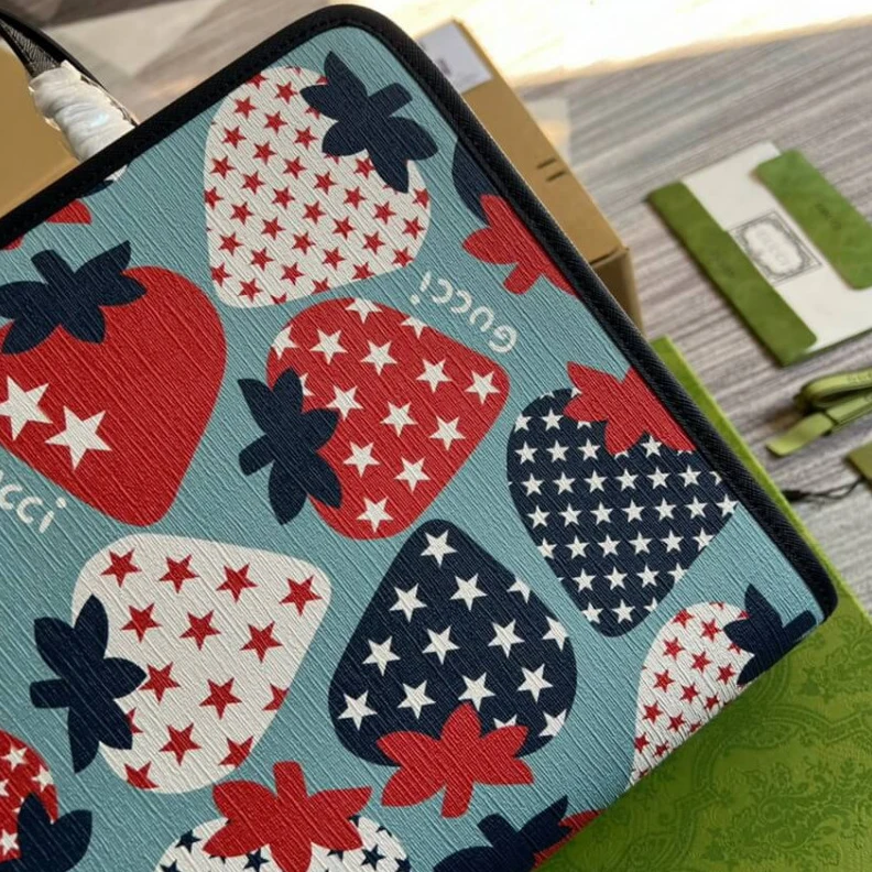 Louis vuitton locations Double ha Gucci Strawberry Star Tote Bag