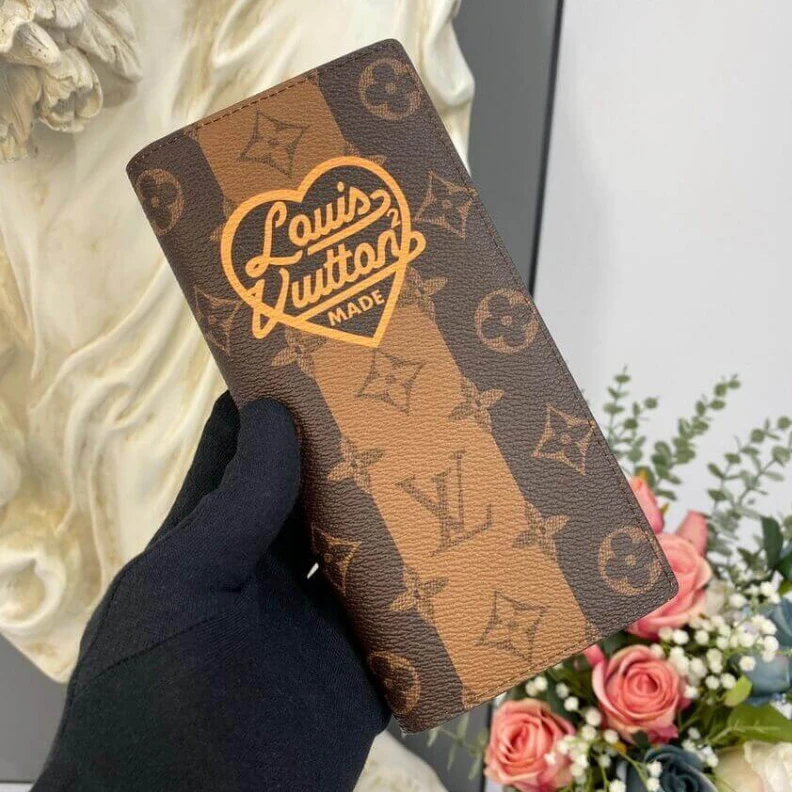 Top lv Part of th Louis VuittoN Monogram Stripes Brazza Wallet