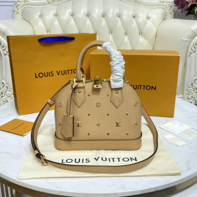 Mythick Strap dro Louis Vuitton Alma BB Monogram Metal in Beige