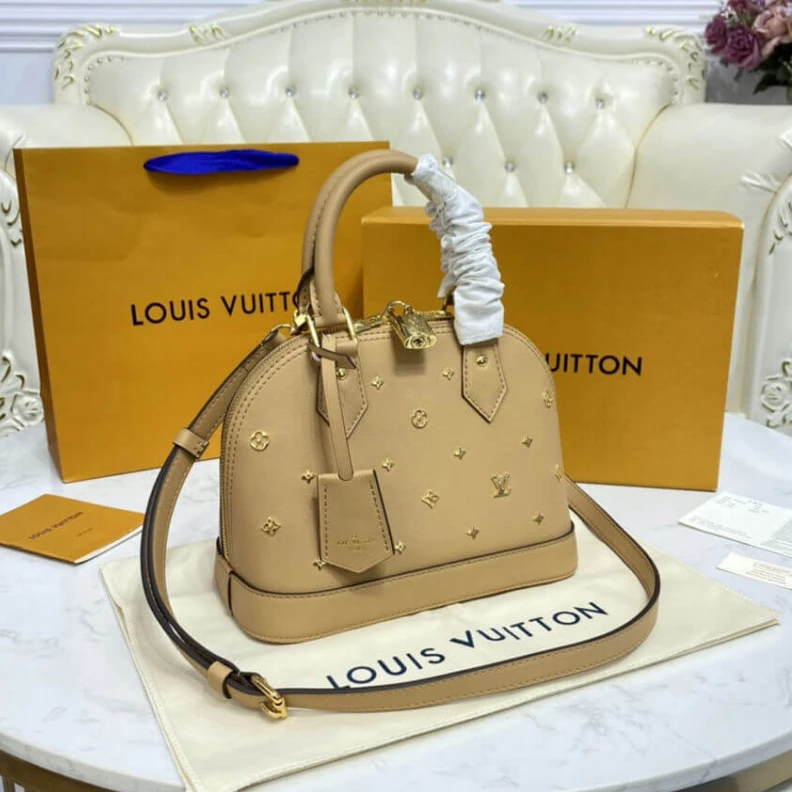 Mythick Strap dro Louis Vuitton Alma BB Monogram Metal in Beige