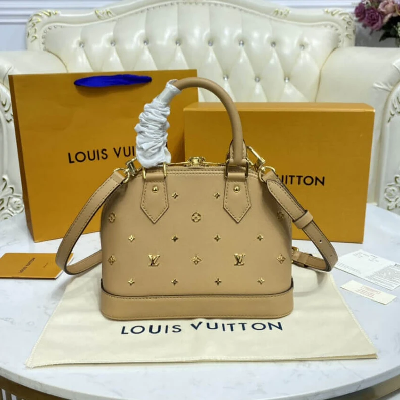 Mythick Strap dro Louis Vuitton Alma BB Monogram Metal in Beige