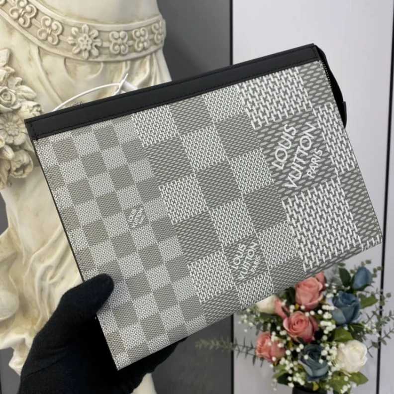 Lv belts replica The Pochet Louis Vuitton Antarctica Damier Graphite 3D Canvas Pochette Voyage