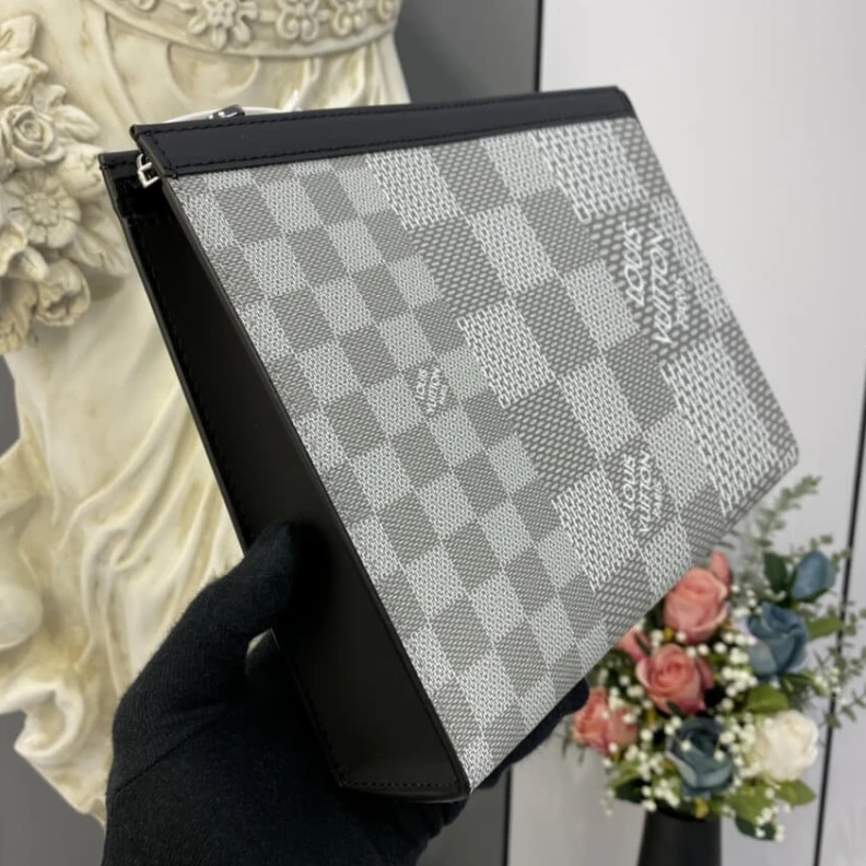 Lv belts replica The Pochet Louis Vuitton Antarctica Damier Graphite 3D Canvas Pochette Voyage