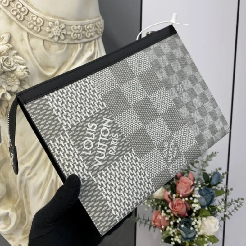 Lv belts replica The Pochet Louis Vuitton Antarctica Damier Graphite 3D Canvas Pochette Voyage