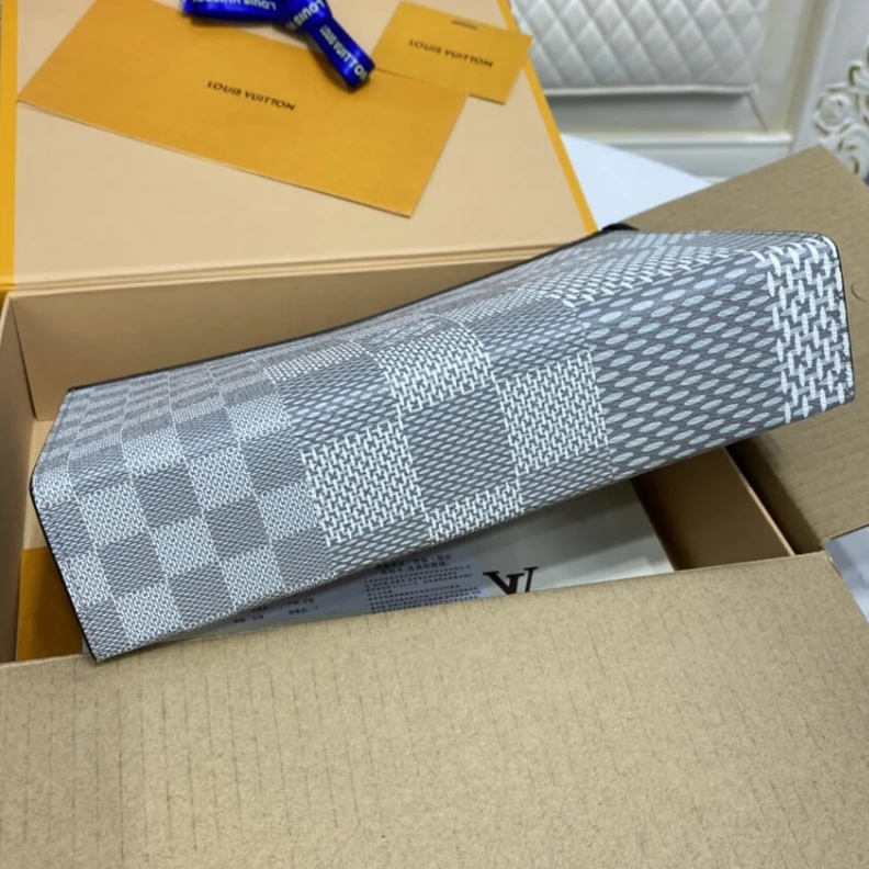 Lv belts replica The Pochet Louis Vuitton Antarctica Damier Graphite 3D Canvas Pochette Voyage