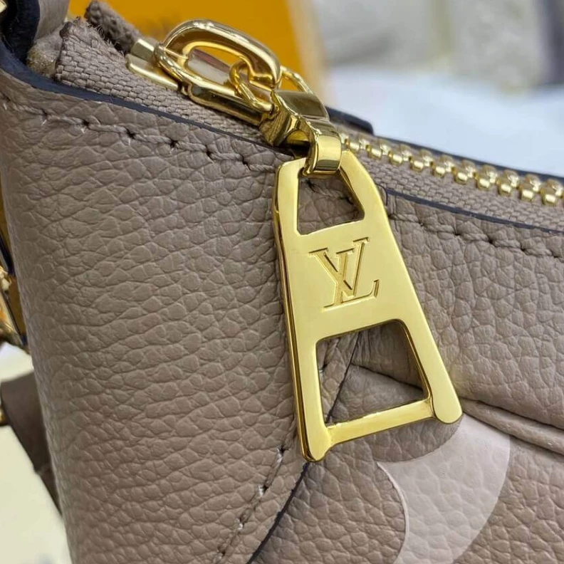 Top lv Tonal mic Louis Vuitton Bicolor Monogram Empreinte Leather Bagatelle Grey Beige