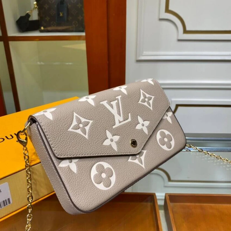 Top lv Goldcolor Louis Vuitton Bicolor Monogram Empreinte Leather Felicie Pochette Gray Cream