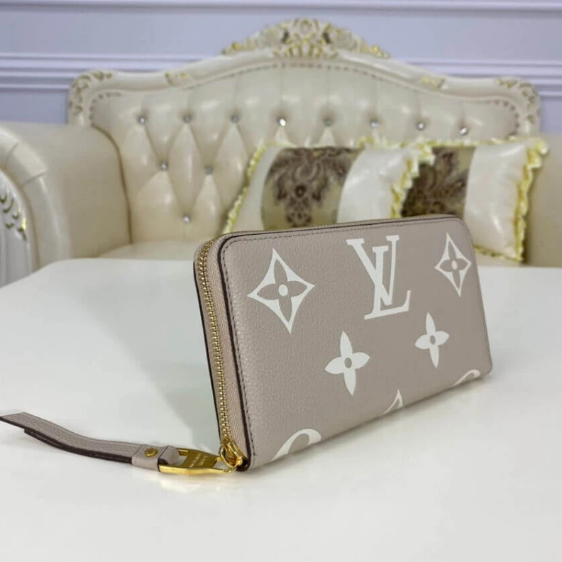 Louis vuitton locations 19.5 x 10 Louis Vuitton Bicolor Monogram Empreinte Leather Zippy Wallet Tourterelle Gray Cream