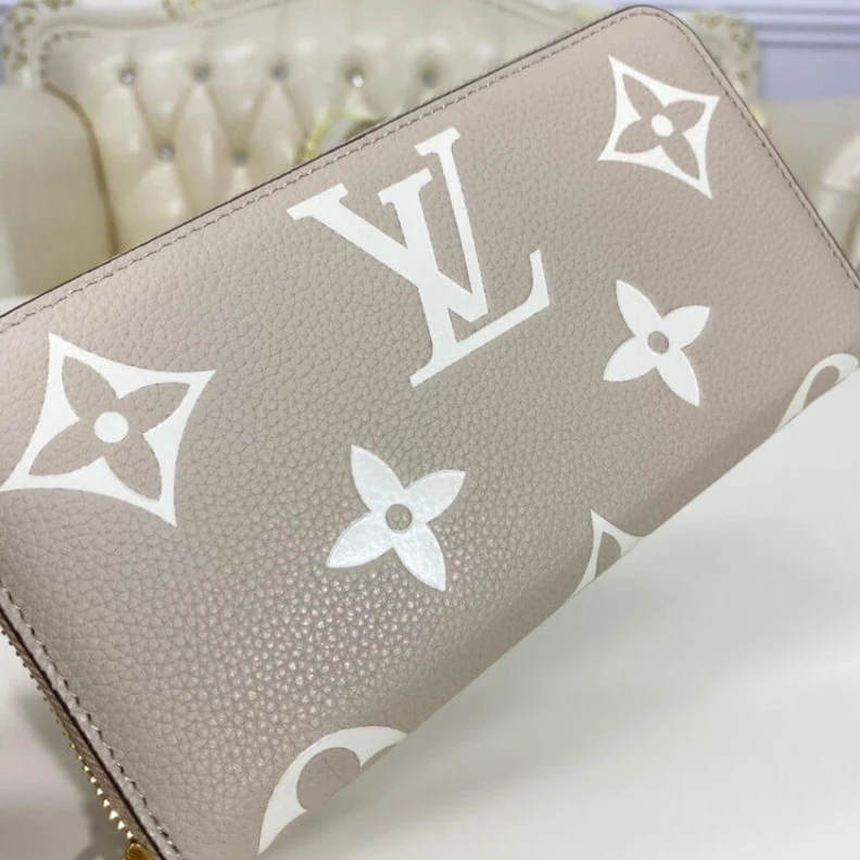 Louis vuitton locations 19.5 x 10 Louis Vuitton Bicolor Monogram Empreinte Leather Zippy Wallet Tourterelle Gray Cream