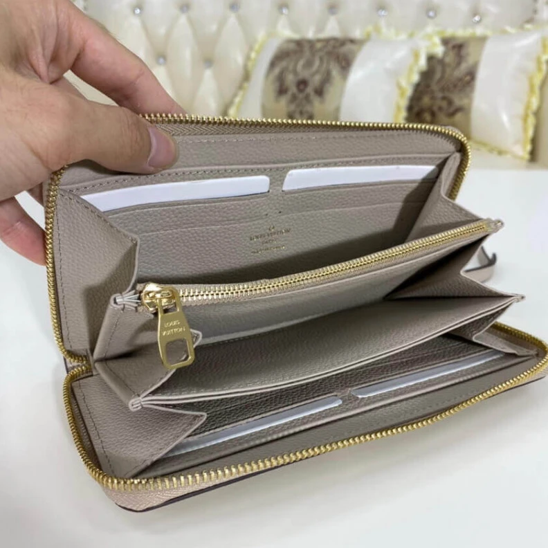 Louis vuitton locations 19.5 x 10 Louis Vuitton Bicolor Monogram Empreinte Leather Zippy Wallet Tourterelle Gray Cream