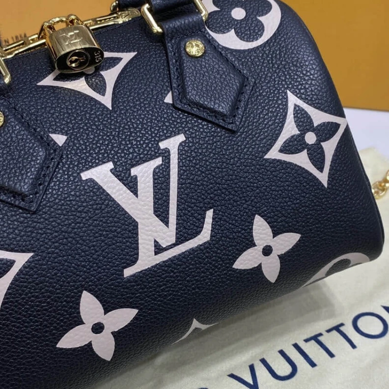 Replica bag Louis Vuitton Bicolor Monogram Empreinte Speedy Bandoulière 20 Black Beige