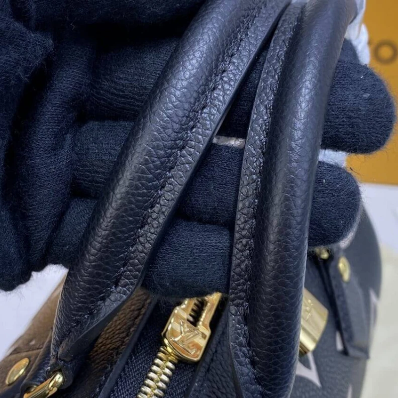 Replica bag Louis Vuitton Bicolor Monogram Empreinte Speedy Bandoulière 20 Black Beige