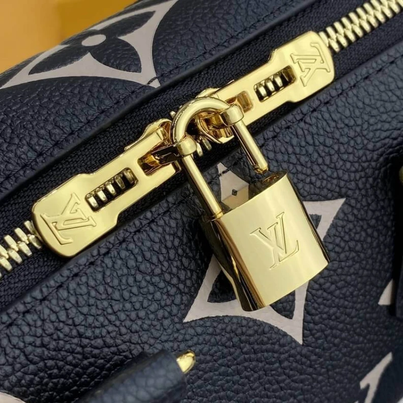Replica bag Louis Vuitton Bicolor Monogram Empreinte Speedy Bandoulière 20 Black Beige