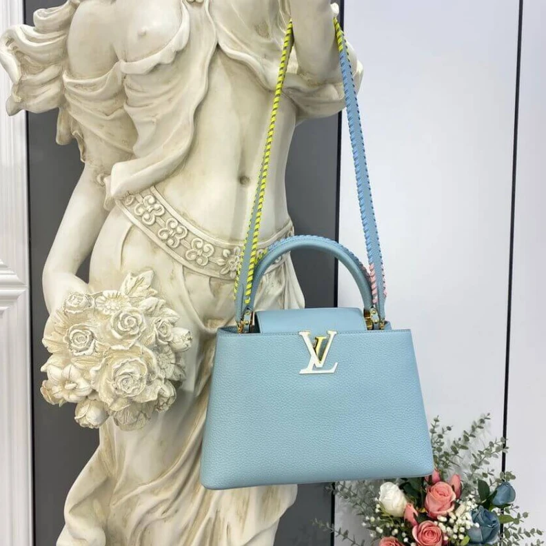 Louis vuitton locations Taurillon Louis Vuitton Capucines MM Bag Olympus Blue