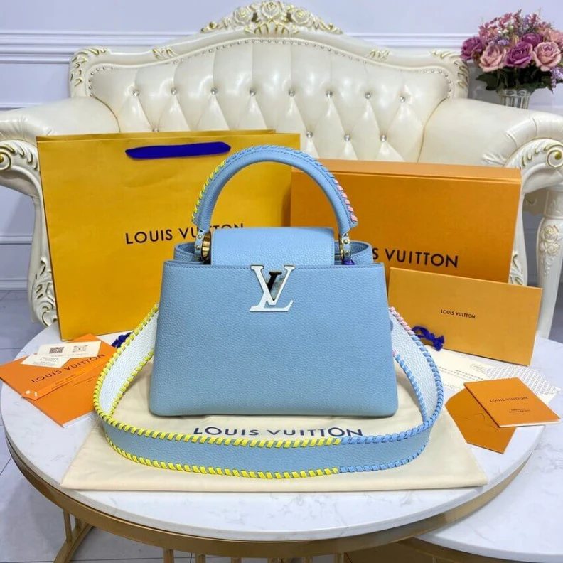 Louis vuitton locations Taurillon Louis Vuitton Capucines MM Bag Olympus Blue