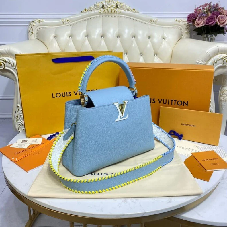 Louis vuitton locations Taurillon Louis Vuitton Capucines MM Bag Olympus Blue