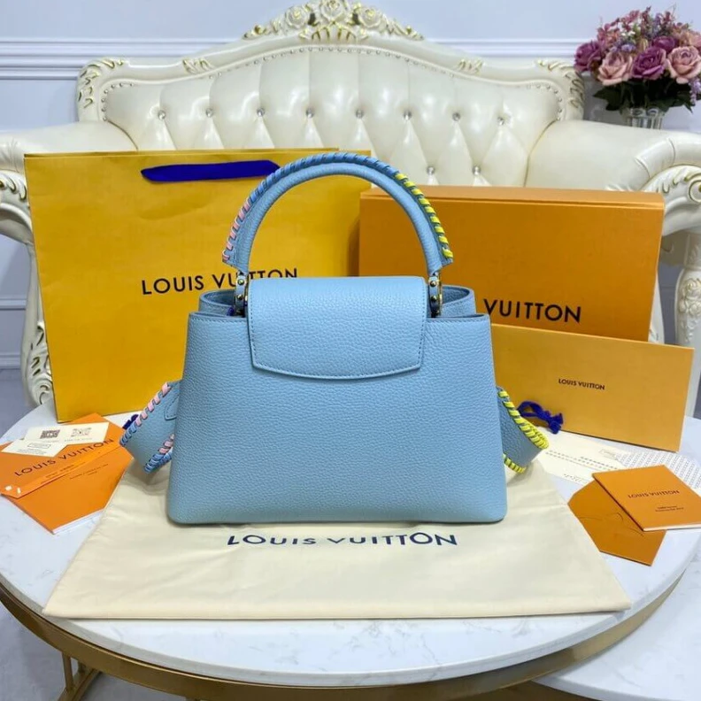 Louis vuitton locations Taurillon Louis Vuitton Capucines MM Bag Olympus Blue