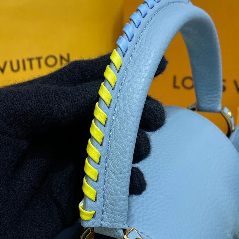 Louis vuitton locations Taurillon Louis Vuitton Capucines MM Bag Olympus Blue