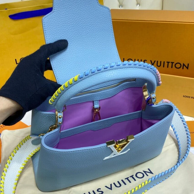 Louis vuitton locations Taurillon Louis Vuitton Capucines MM Bag Olympus Blue
