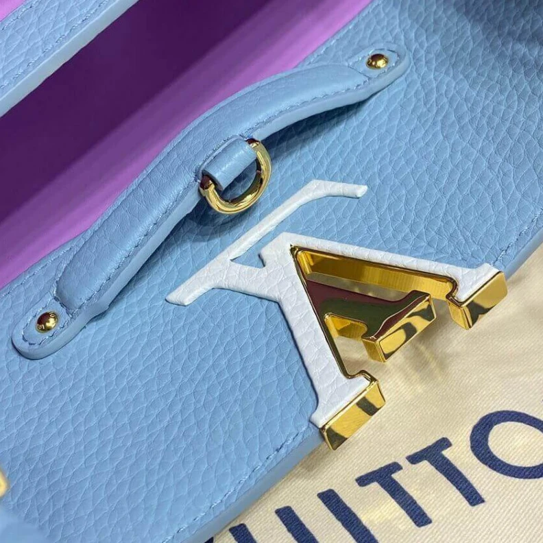 Louis vuitton locations Taurillon Louis Vuitton Capucines MM Bag Olympus Blue
