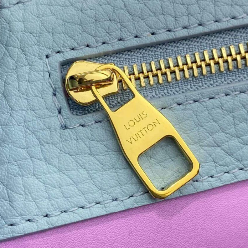 Louis vuitton locations Taurillon Louis Vuitton Capucines MM Bag Olympus Blue