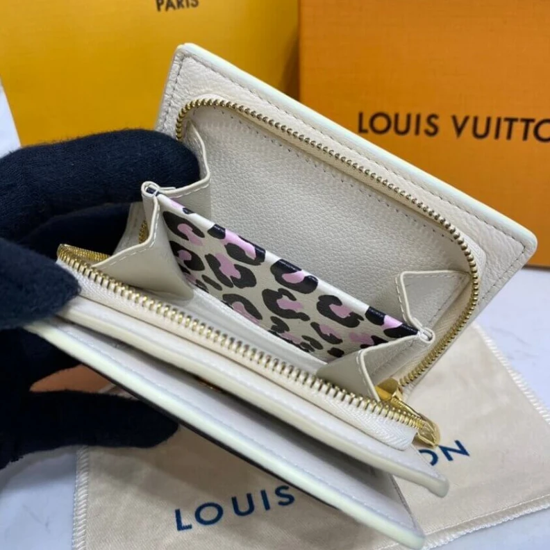 Louis vuitton locations Inside ca Louis Vuitton Clea Wallet Creme