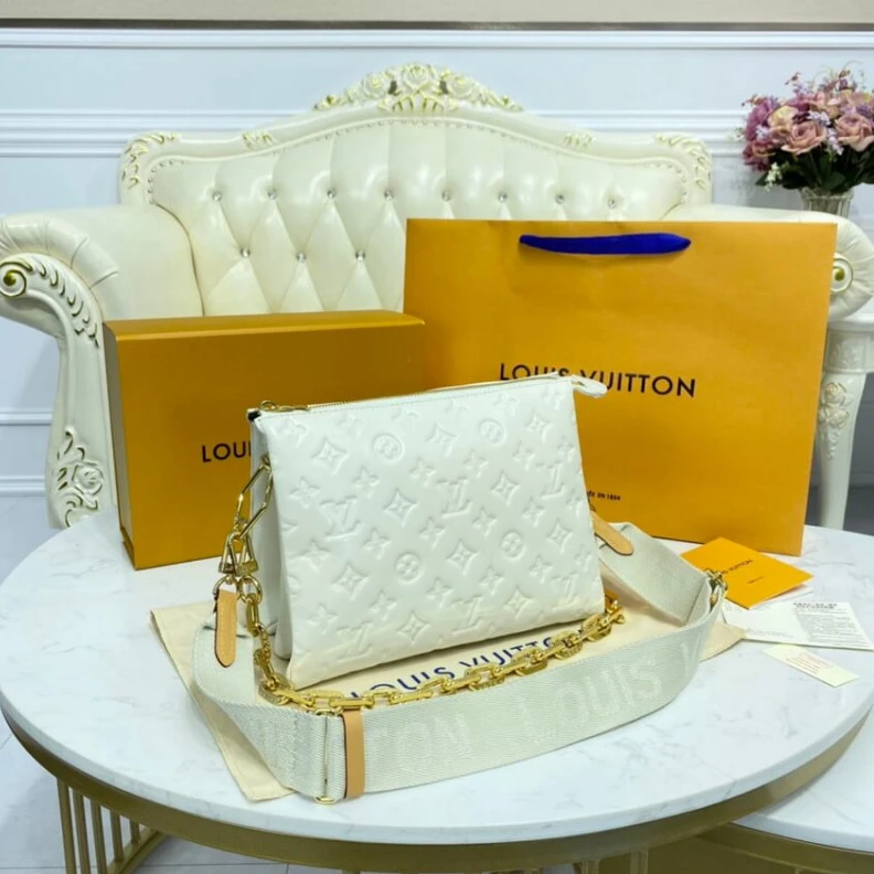 Top lv Strap dro Louis Vuitton Coussin PM Cream