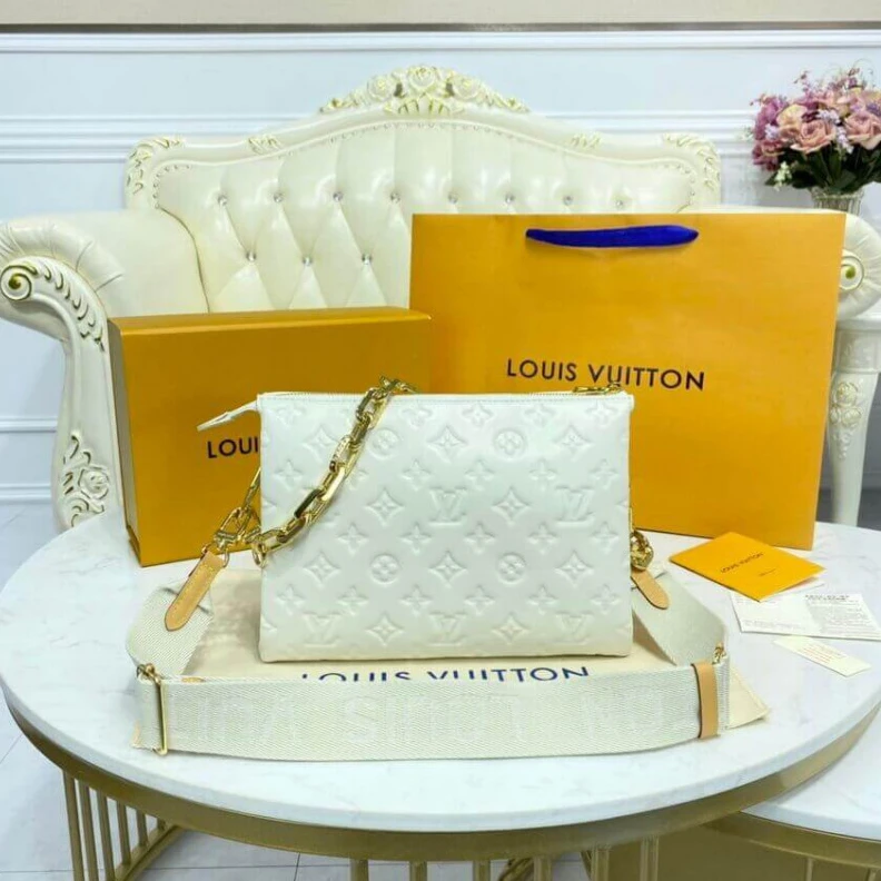 Top lv Strap dro Louis Vuitton Coussin PM Cream