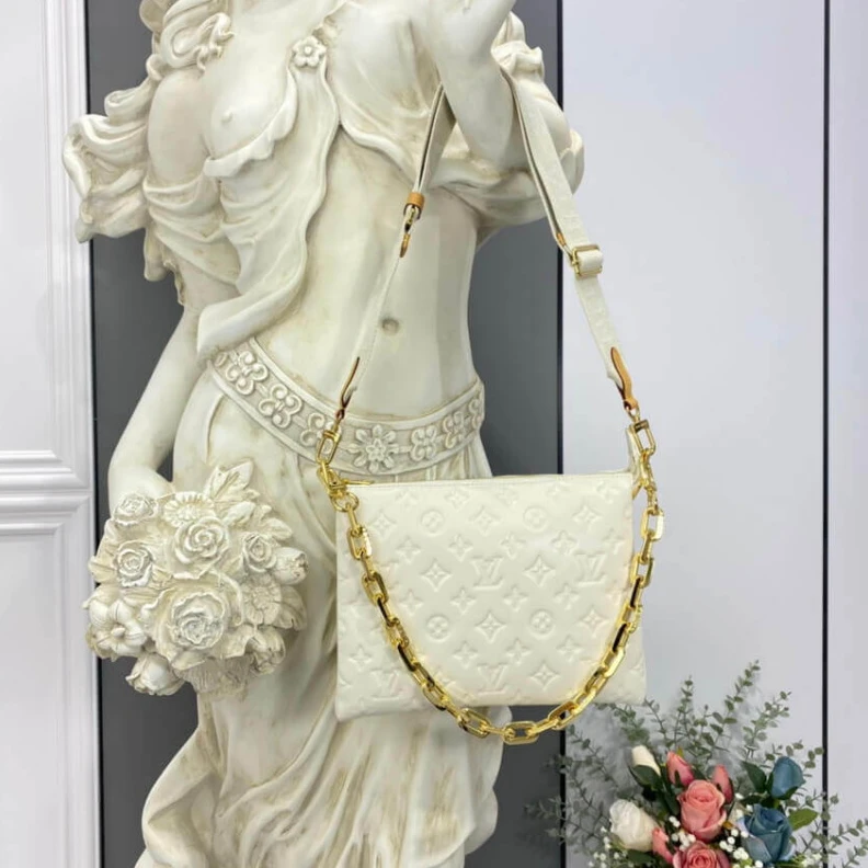 Mythick ru One of the Louis Vuitton Coussin PM
