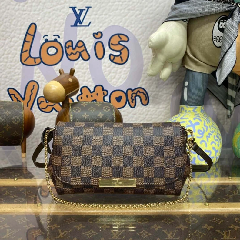 Louis vuitton locations Shiny gol LV Damier Ebene Canvas Favorite PM