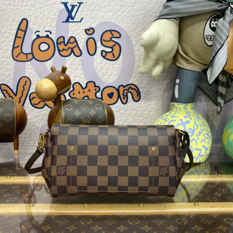 Louis vuitton locations Shiny gol LV Damier Ebene Canvas Favorite PM