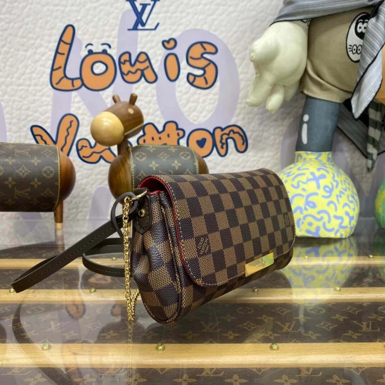 Louis vuitton locations Shiny gol LV Damier Ebene Canvas Favorite PM