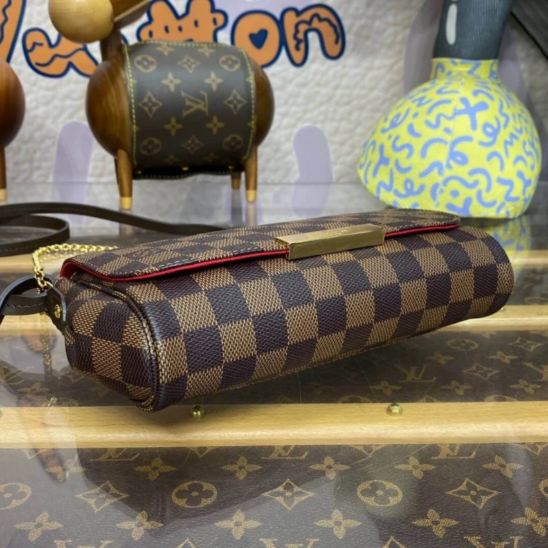 Louis vuitton locations Shiny gol LV Damier Ebene Canvas Favorite PM