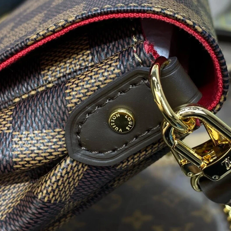 Louis vuitton locations Shiny gol LV Damier Ebene Canvas Favorite PM
