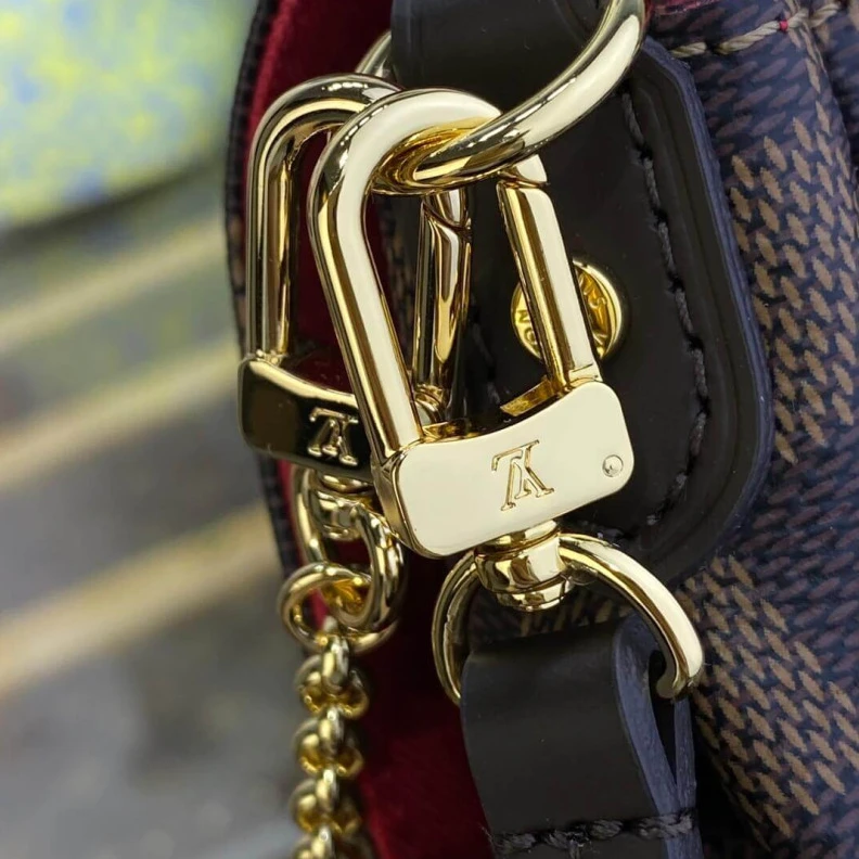 Louis vuitton locations Shiny gol LV Damier Ebene Canvas Favorite PM