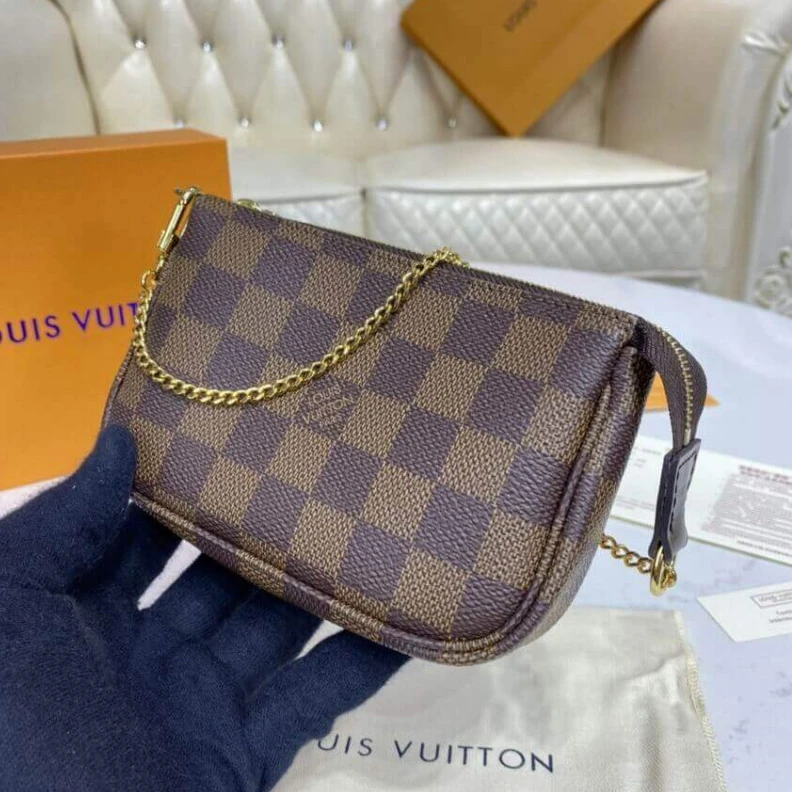 Louis vuitton locations Textile l Louis Vuitton Damier Ebene Mini Pochette Accessoires