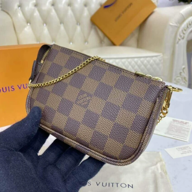 Louis vuitton locations Textile l Louis Vuitton Damier Ebene Mini Pochette Accessoires