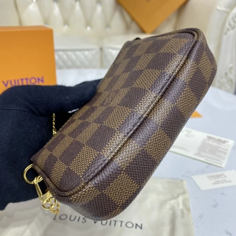 Louis vuitton locations Textile l Louis Vuitton Damier Ebene Mini Pochette Accessoires