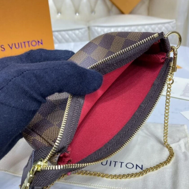 Louis vuitton locations Textile l Louis Vuitton Damier Ebene Mini Pochette Accessoires