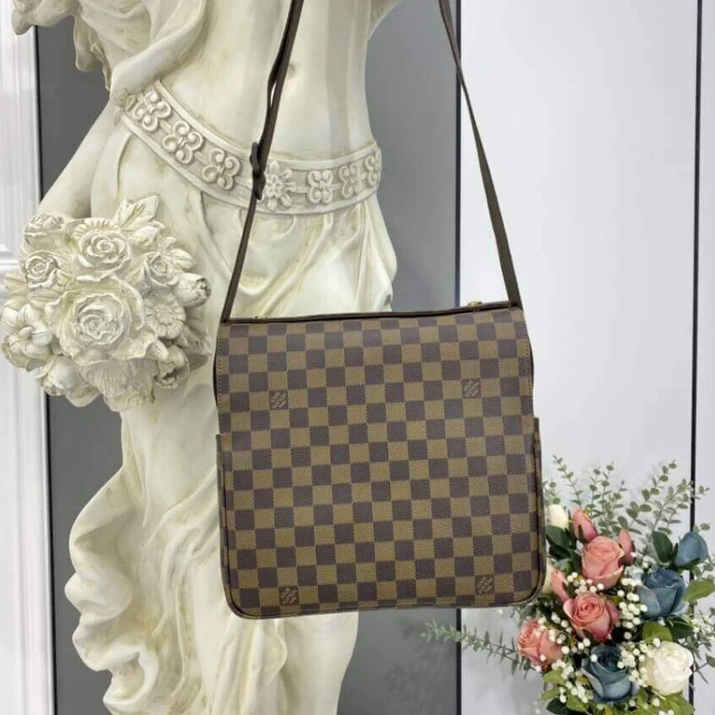 Replica bag This fully Louis Vuitton Damier Ebene Naviglio Messenger Bag