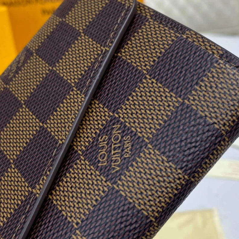 Replica bags lv Press stu Louis Vuitton Damier Ebene Sarah Wallet Pink