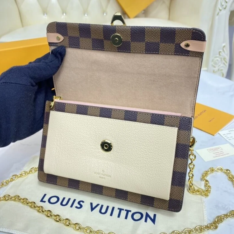 Lv belts replica The Vavin LV Damier Ebene Vavin Chain Wallet Creme