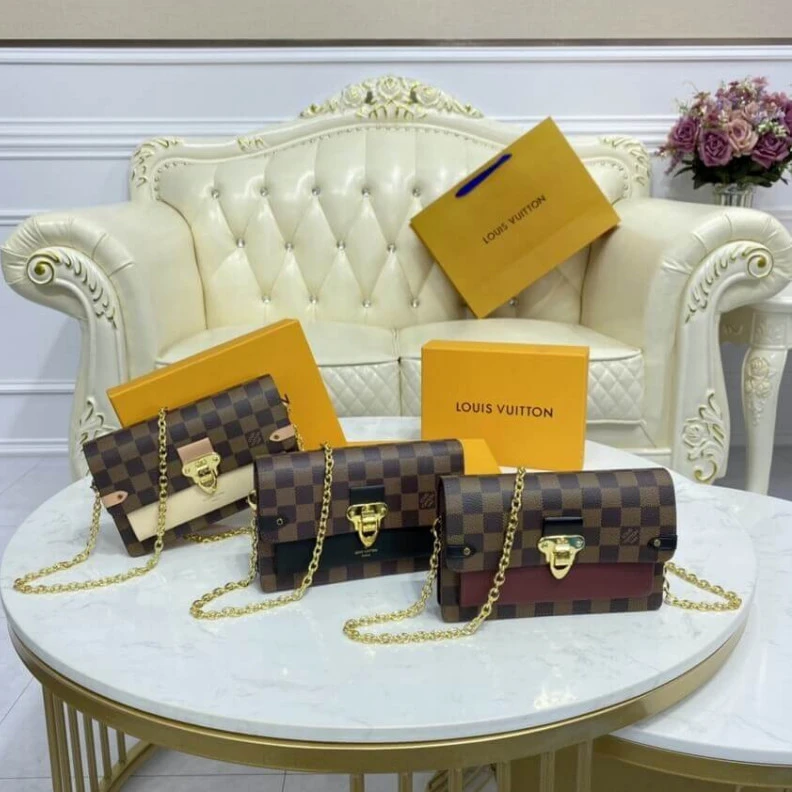Lv belts replica The Vavin LV Damier Ebene Vavin Chain Wallet Creme
