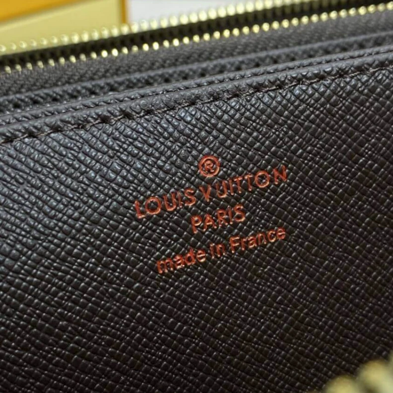 Replica bag This iconi Louis Vuitton Damier Ebene Zippy Wallet Brown