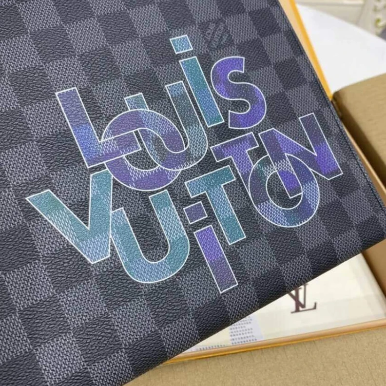 Lv belts replica The versat Louis Vuitton Damier Graphite Pochette Voyage MM