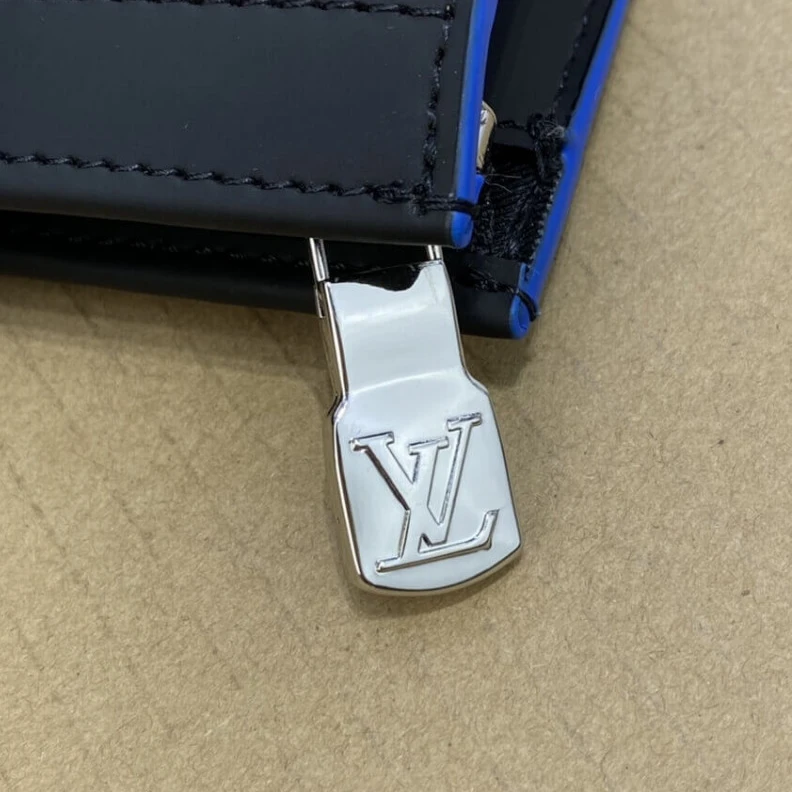 Lv belts replica The versat Louis Vuitton Damier Graphite Pochette Voyage MM