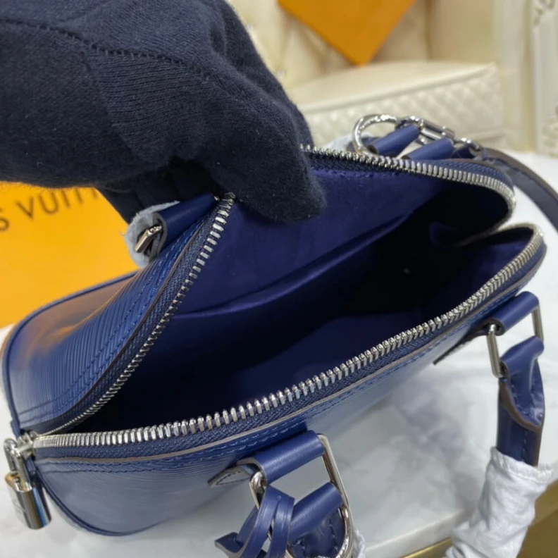 Top lv Smooth co Louis Vuitton Epi Leather Alma BB Blue