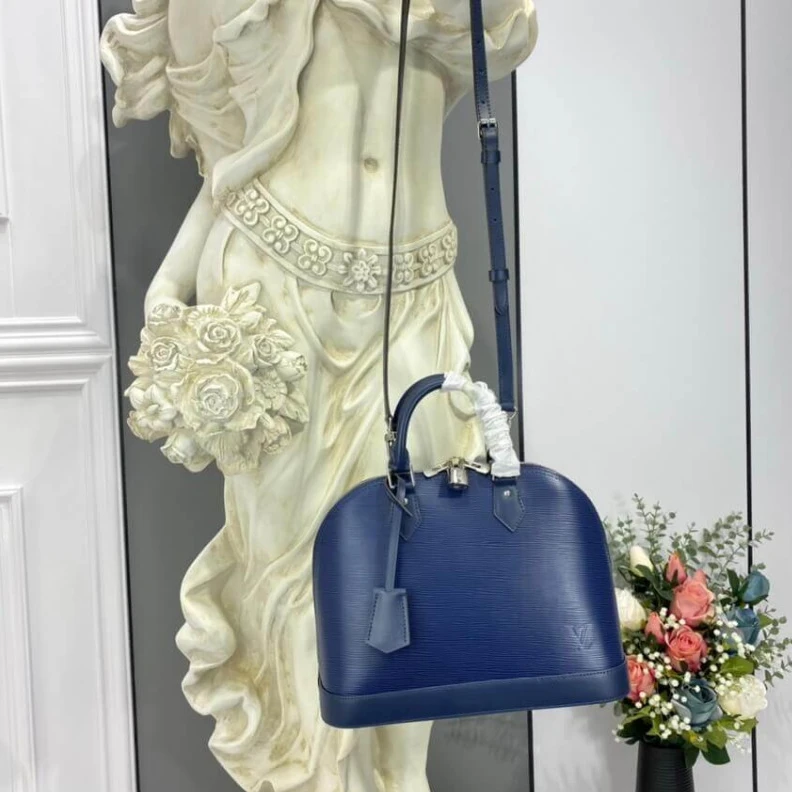 Replica bags lv Handle: S Louis Vuitton Epi Leather Alma PM Blue
