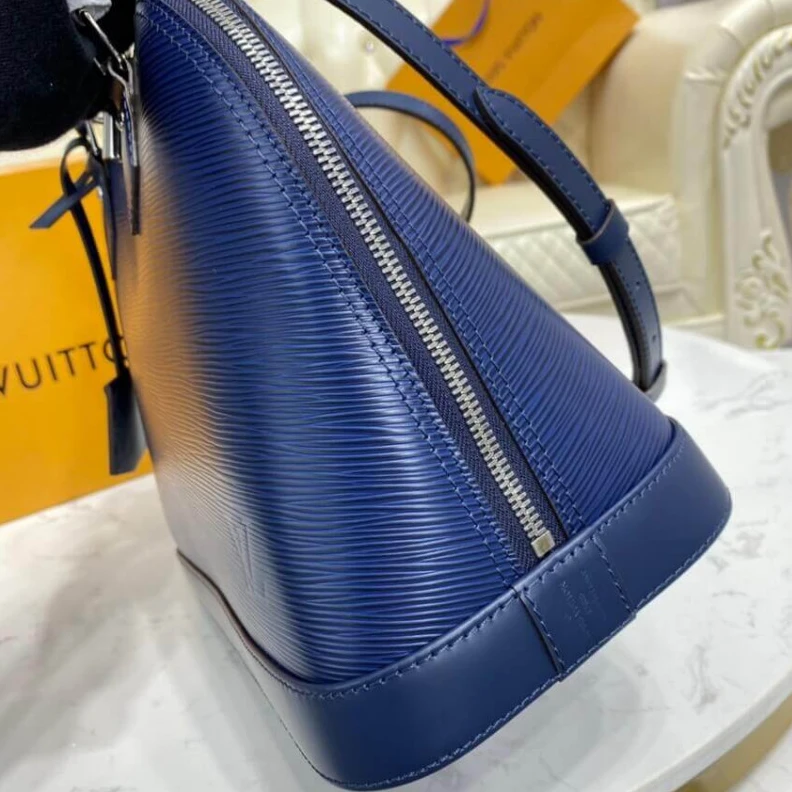 Replica bags lv Handle: S Louis Vuitton Epi Leather Alma PM Blue